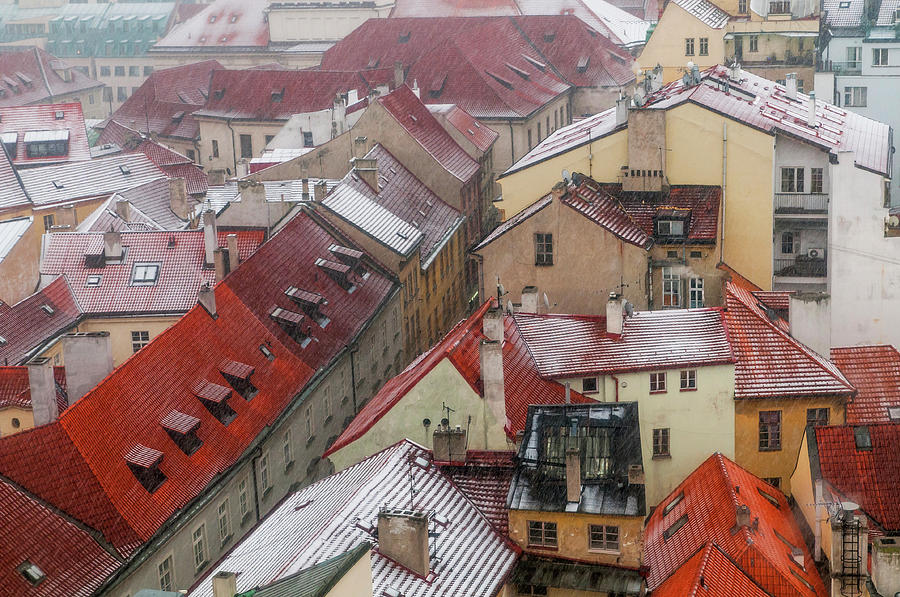 Snowy Christmas Prague. Red Roofs of Old Town Photograph by Jenny Rainbow