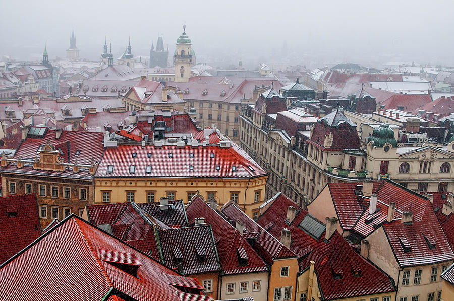 Snowy Christmas Prague. Stare Mesto Red Roofs Photograph by Jenny Rainbow