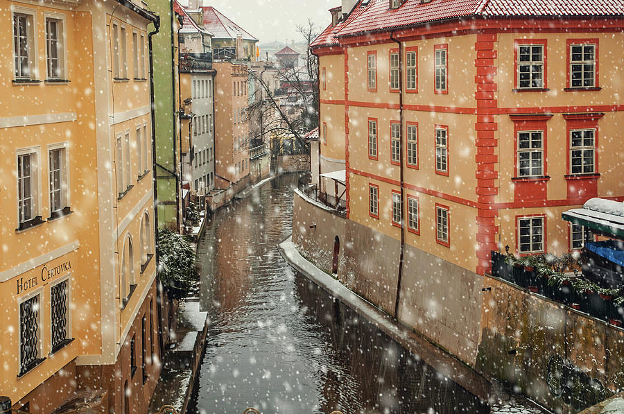 Snowy Prague. Devil Stream Snowfall Photograph by Jenny Rainbow