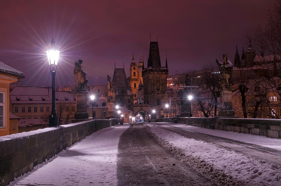 Snowy Prague. Purple Night 1 Photograph by Jenny Rainbow
