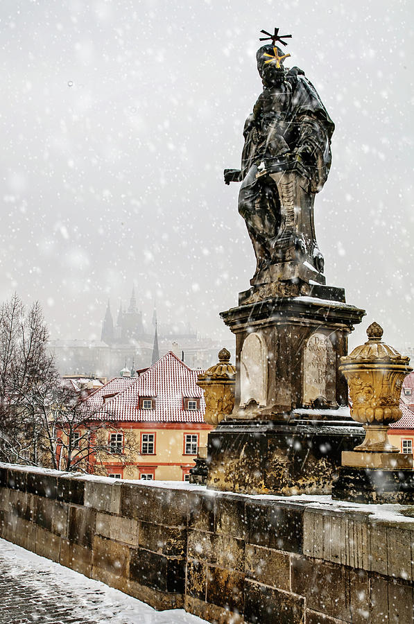 Snowy Prague. St Anthony of Padua on the Charles Bridge Photograph by Jenny Rainbow