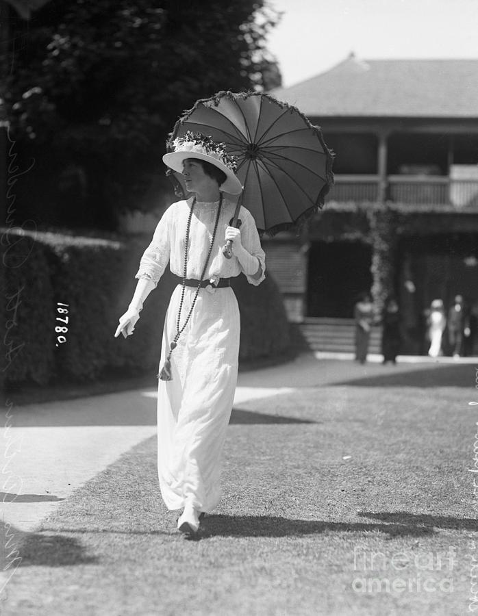 Socialite Strolling With A Parasol Photograph by Bettmann