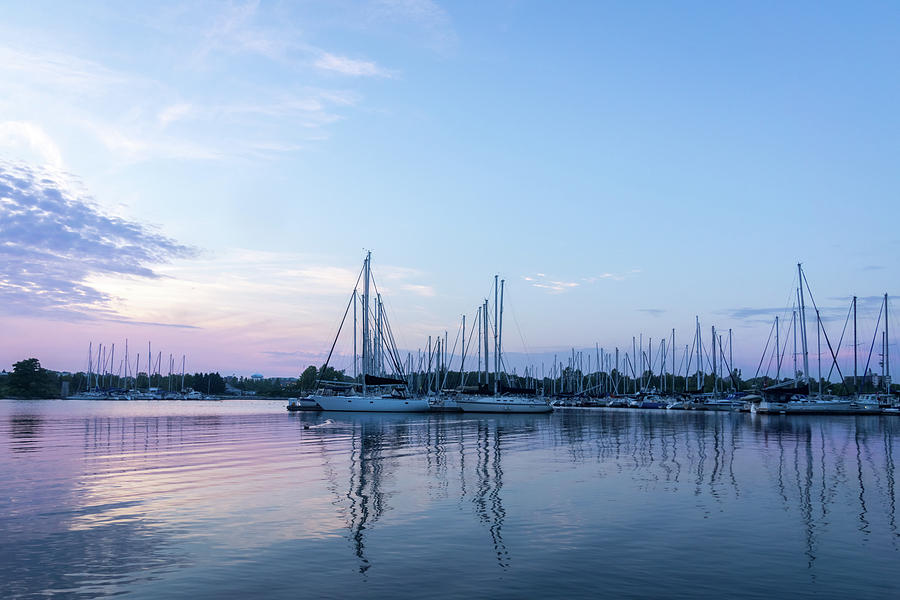 Soft Blue and Pink Ripples - Yachts and Clouds Reflections Photograph by Georgia Mizuleva