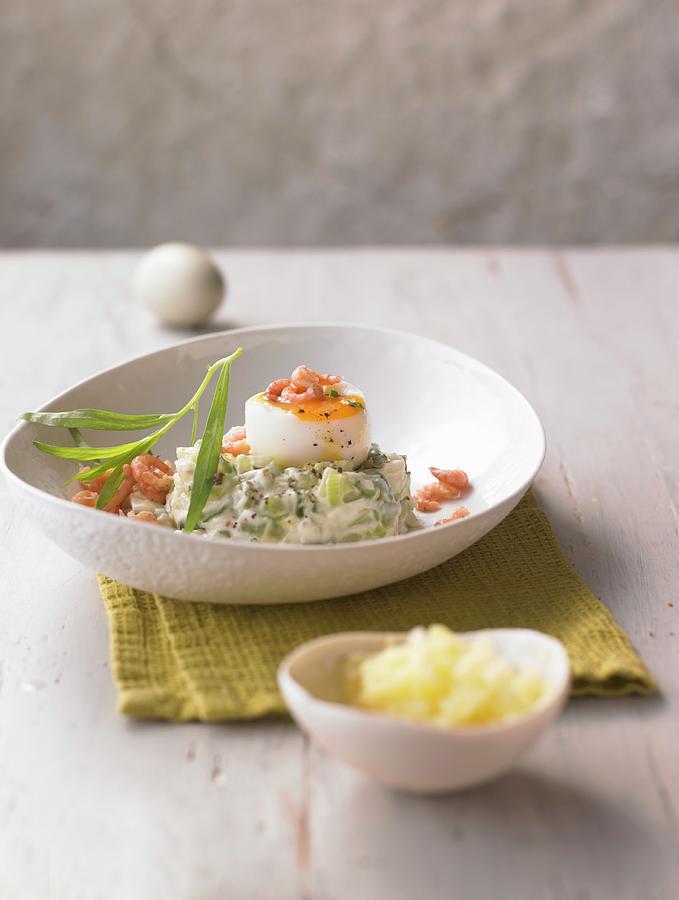 Soft-boiled Egg On A Cucumber Medley With Tarragon And Shrimps Photograph by Jalag / Jan-peter Westermann