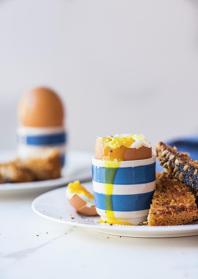 Soft Boiled Eggs And Toast Photograph by Hein Van Tonder