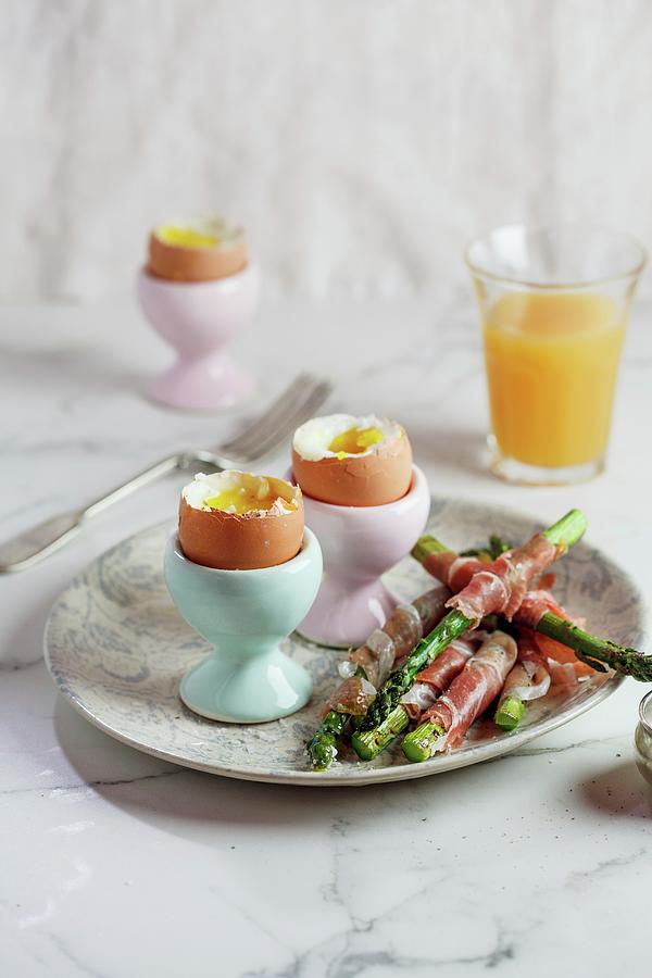 Soft-boiled Eggs With Parma Ham-wrapped Asparagus Photograph by Great Stock!