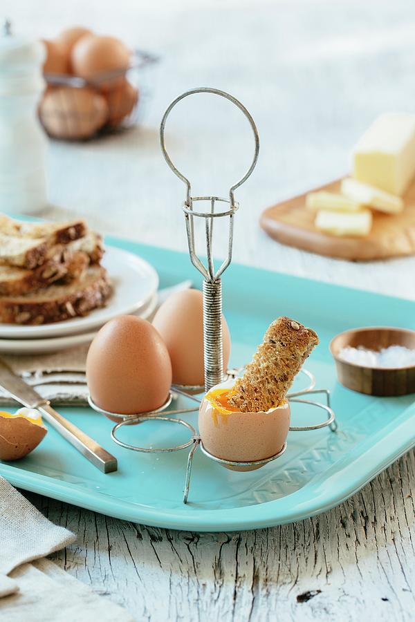 Soft-boiled Eggs With Toast In An Egg Rack Photograph by Tracey Kusiewicz