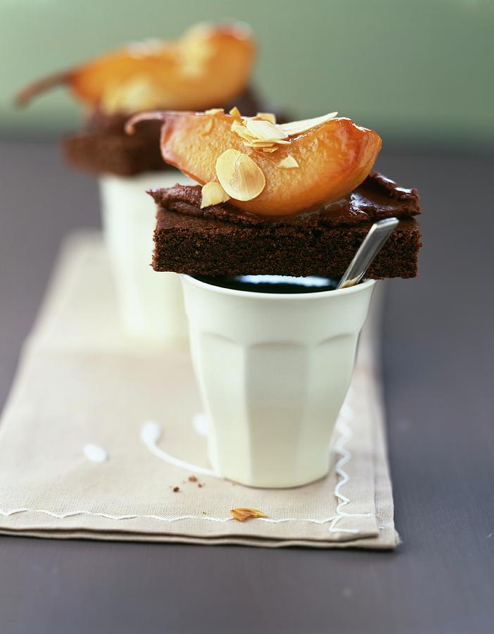 Soft Chocolate Cake With Stewed Pear Photograph by Roulier-turiot
