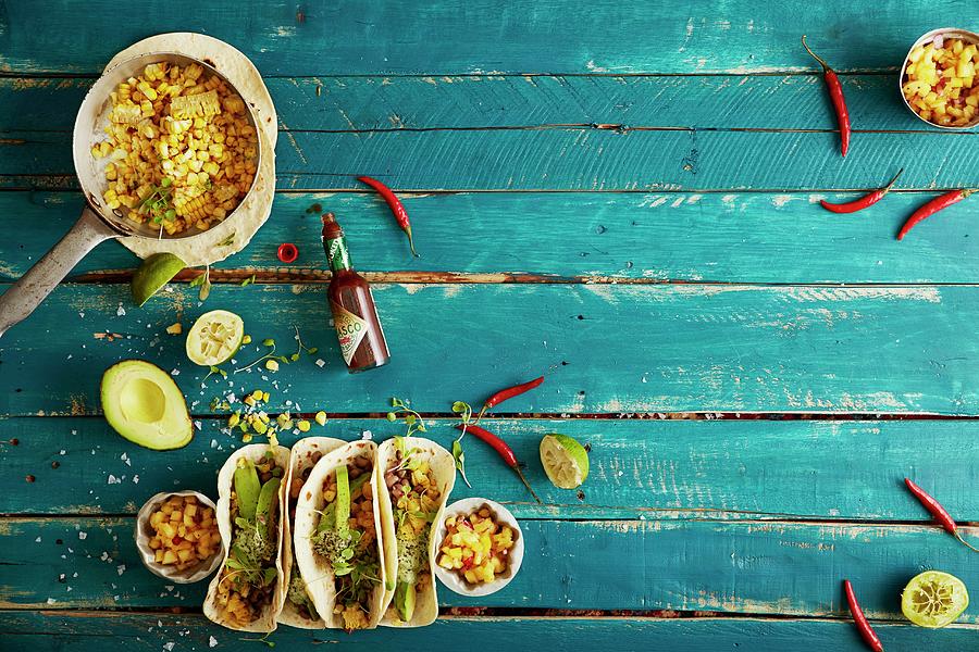 Soft Shell Tacos With Grilled Sweet Corn, Spicy Black Eye Beans, Cashew Nut Cream And A Pineapple And Chilli Salsa mexico Photograph by Great Stock!