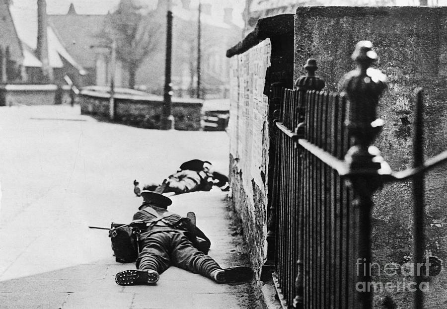 Soldier Crawling Over Bridge, With Gun Photograph by Bettmann