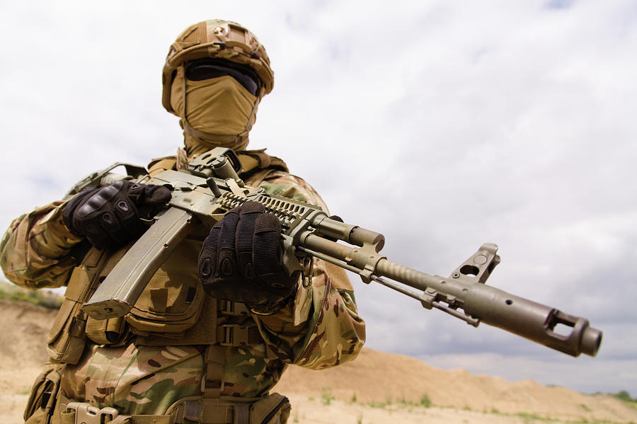 Soldier Holding Rifle, Low Angle View Photograph By Oleg Zabielin 