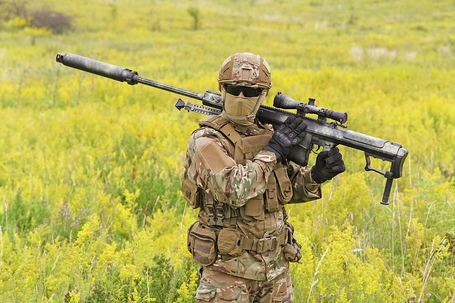 Soldier With Big Sniper Rifle Walking Photograph by Oleg Zabielin ...