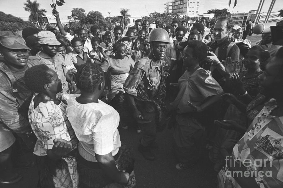 Soldiers And Citizens Of Uganda Dancing Photograph by Bettmann