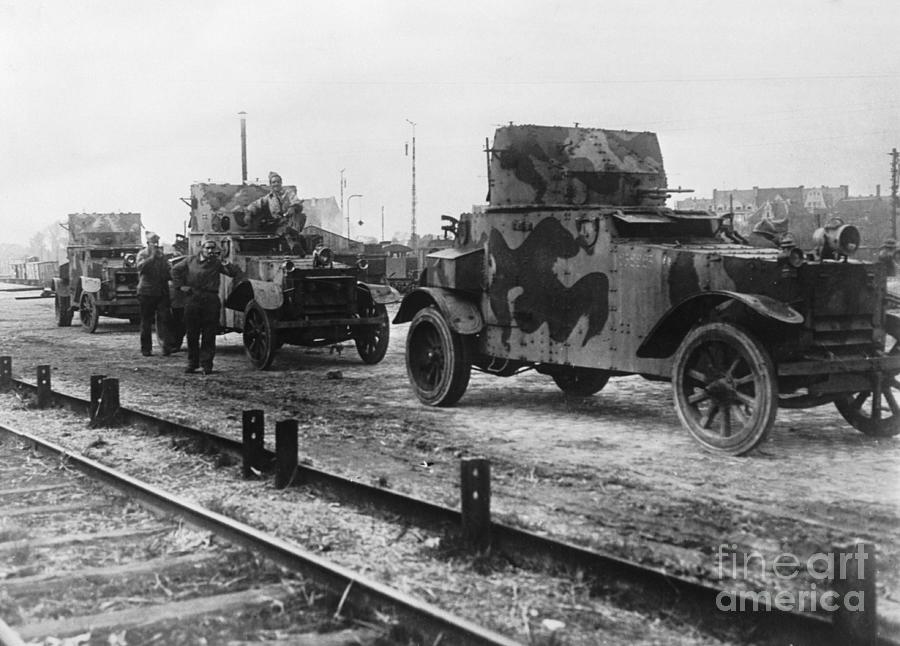 Soldiers And Jeeps Alongside Railroad Photograph by Bettmann