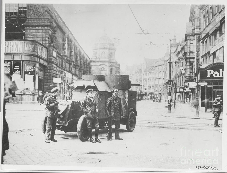 Soldiers And Vehicle In Center Of Street Photograph by Bettmann