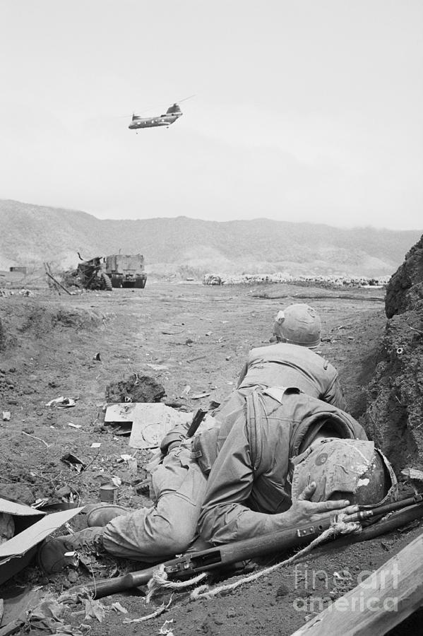 Soldiers Ducking For Cover Photograph by Bettmann