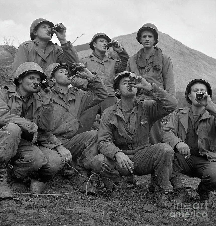 Soldiers Gulp Down Coca Cola Photograph by Bettmann