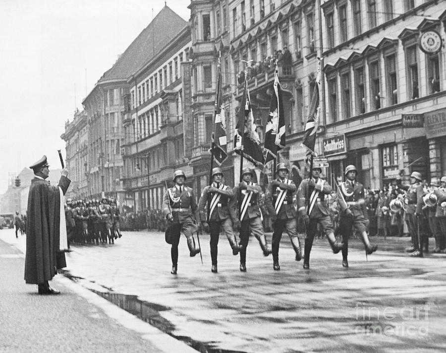 Soldiers High Stepping Past Officer Photograph by Bettmann