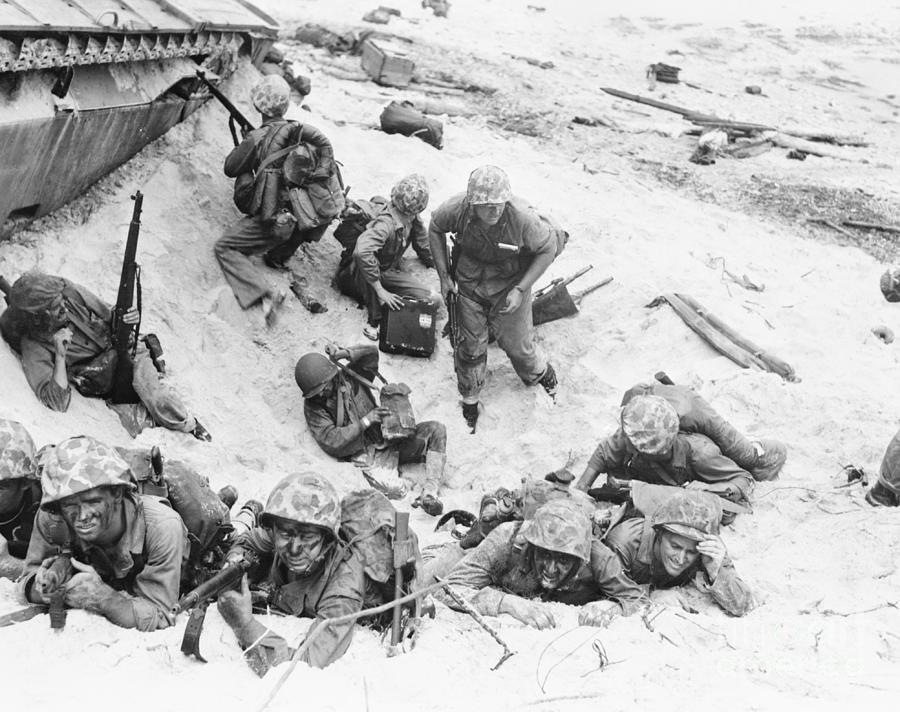 Soldiers In Taking Cover In Shell Hole Photograph by Bettmann