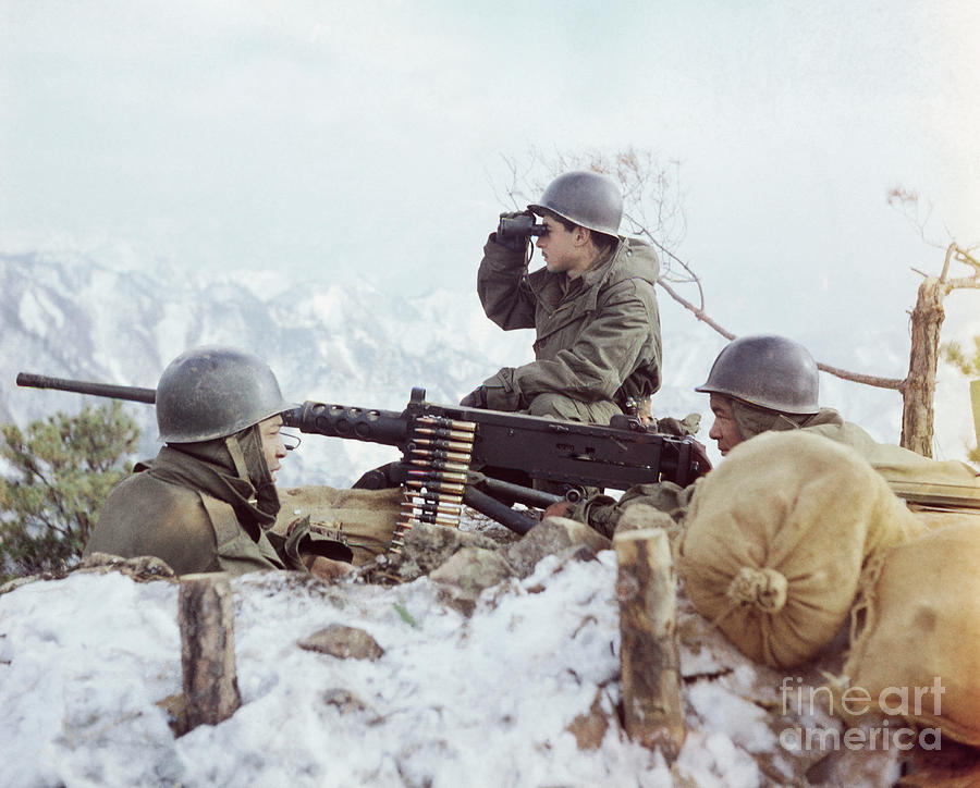 Soldiers Manning Machine Gun Photograph by Bettmann