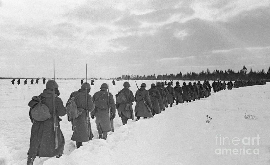 Soldiers Marching Over Snow Photograph by Bettmann