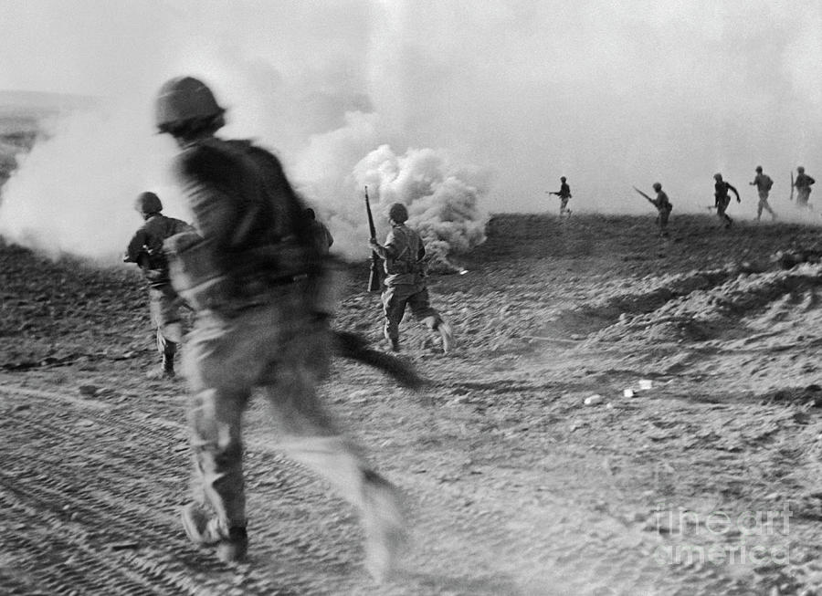 Soldiers Performing Maneuvers Photograph by Bettmann