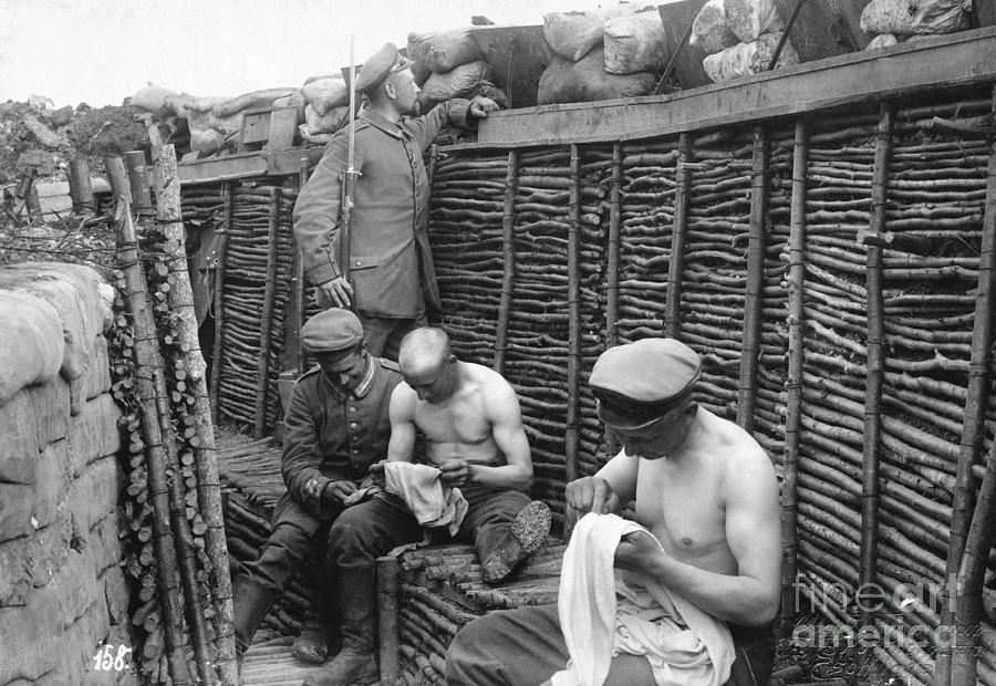 Soldiers Picking Lice From Clothes Photograph by Bettmann