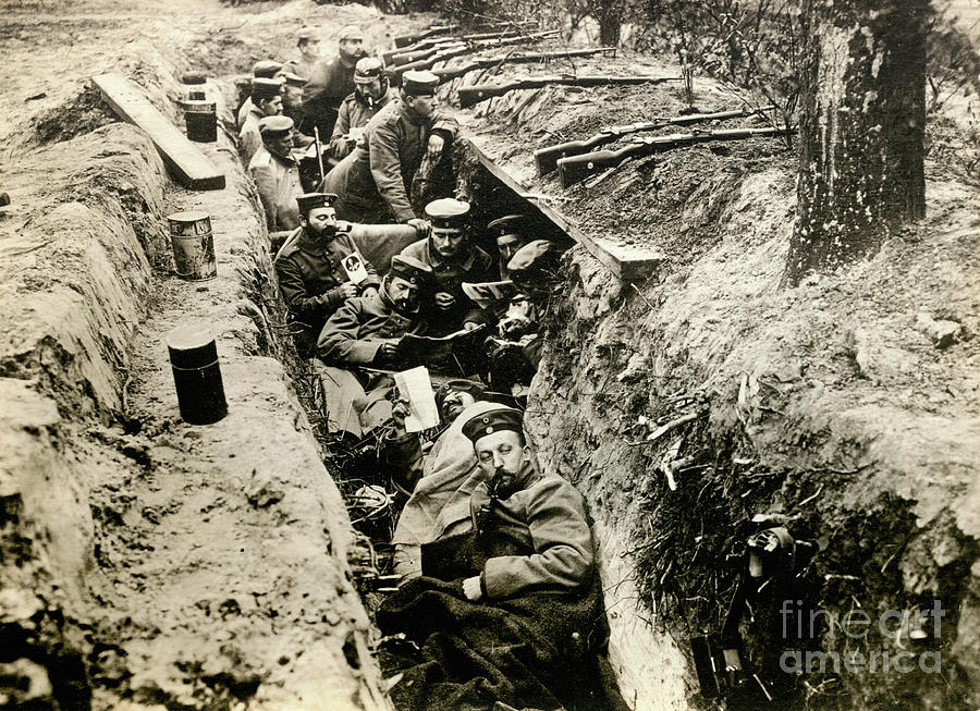 Soldiers Relaxing In Trench Photograph by Bettmann