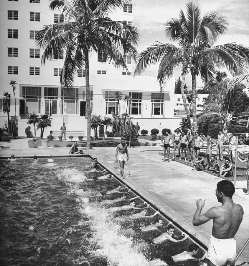 Soldiers Taking Swimming Lessons In The Photograph by William C. Shrout Soldiers Taking Swimming Lessons In The Photograph by William C. Shrout