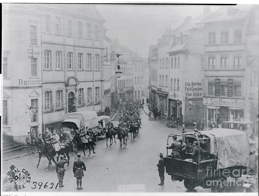 Soldiers Traveling Through Town Photograph by Bettmann