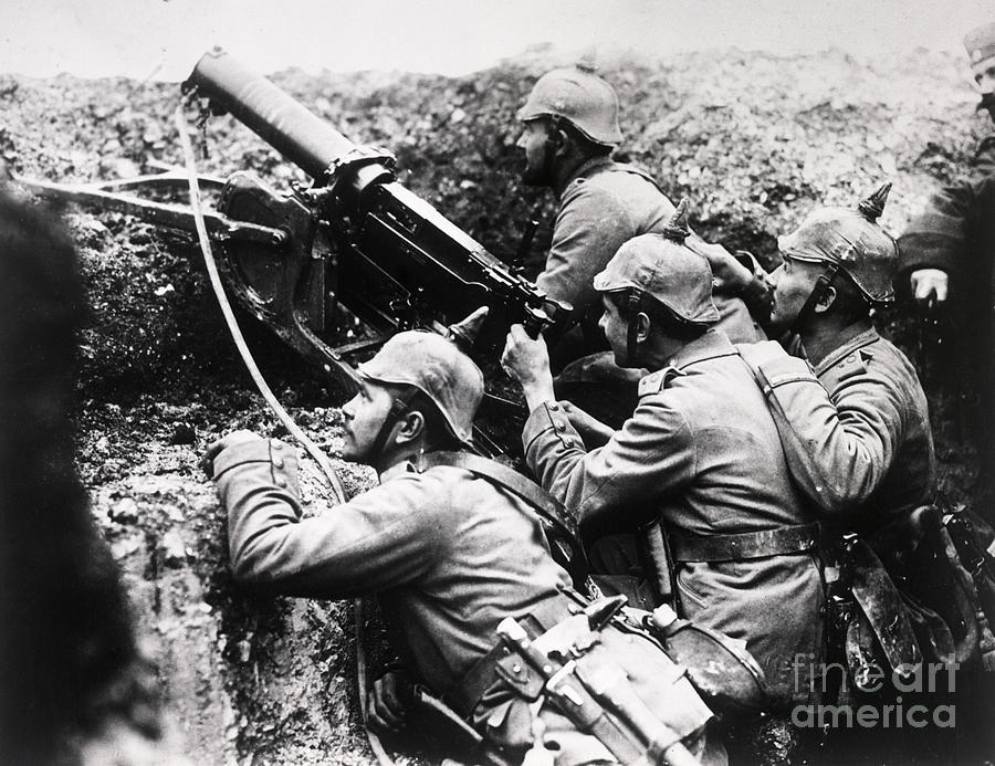 Soldiers Utilizing Machine Gun Photograph by Bettmann