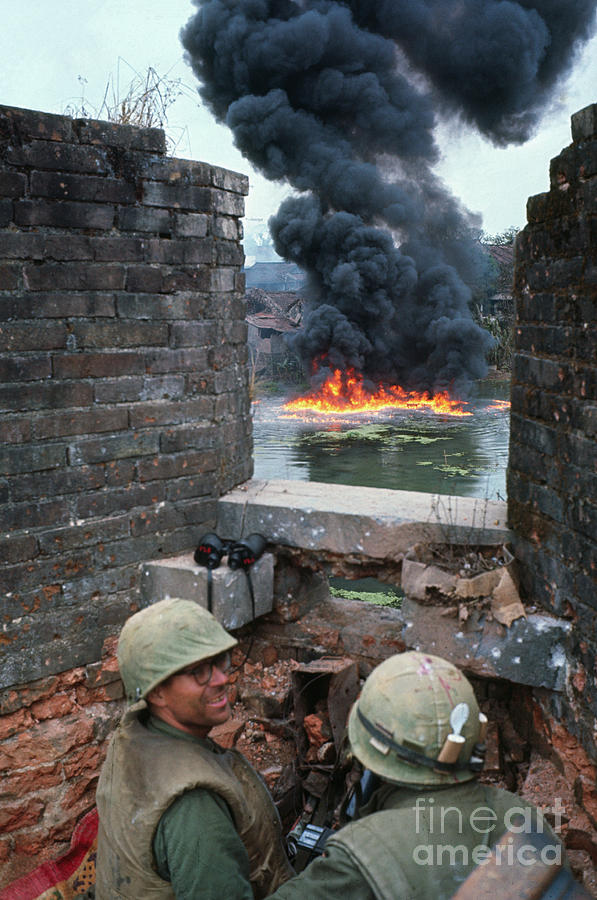 Soldiers Watching A Bomb Explosion Photograph by Bettmann