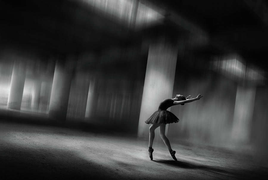 Black And White Photograph - Sole Dancer by Sebastian Kisworo