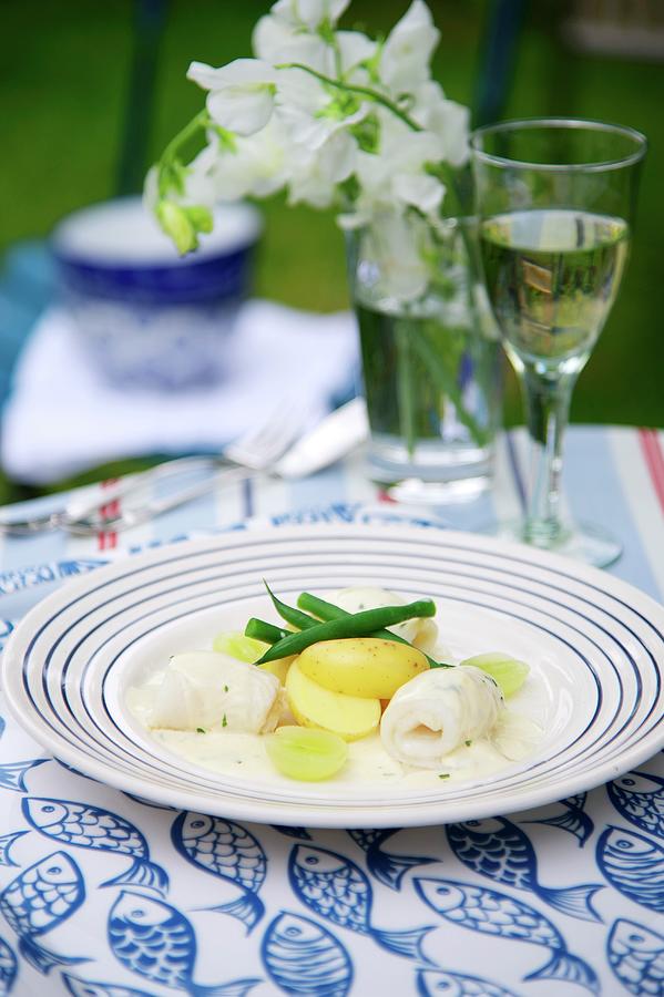 Fish Photograph - Sole In A Creamy Sauce With Grapes Served With Potatoes And Green Beans by Winfried Heinze