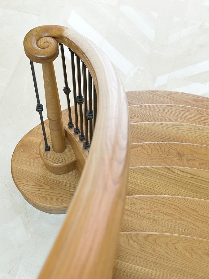 Solid Oak Staircase With Curved Bannister Rail, Spiral Newel Post And Wrought Iron Balusters Photograph by Simon Maxwell Photography