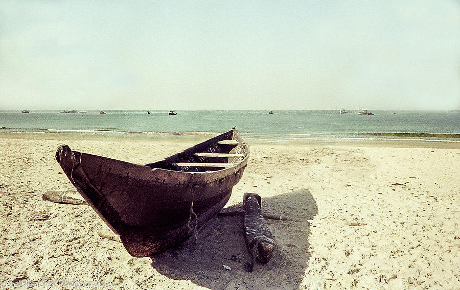 Solitary boat on a beach in Goa by Pete Hendley Solitary boat on a beach in Goa by Pete Hendley