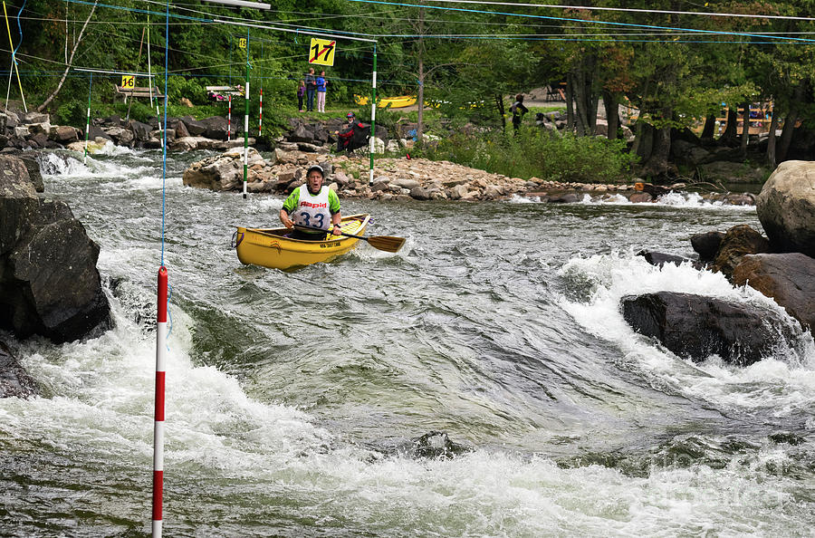 Solo whitewater paddler approaching a chute Photograph by Les Palenik
