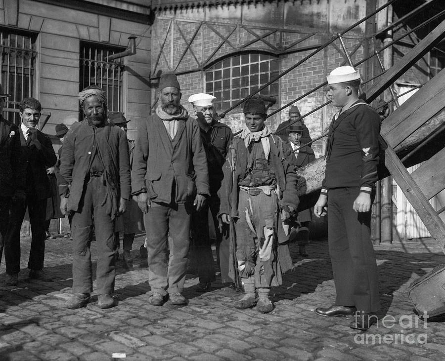 Some Ragged Looking Refugees Wsailor Photograph by Bettmann