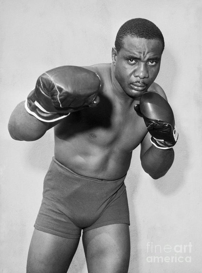 Sonny Liston Posing With Gloves by Bettmann