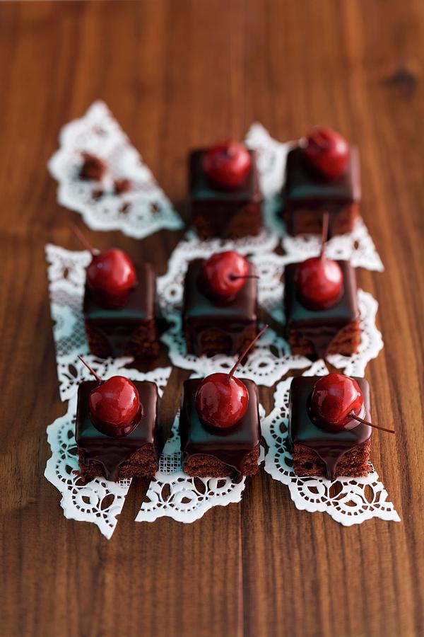 Sour Cherry And Chocolate Petit Fours Photograph by Michael Wissing