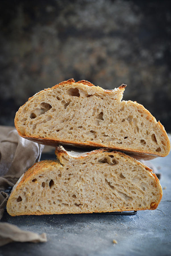 Sourdough Bread Cut In Half Photograph by Karolina Smyk