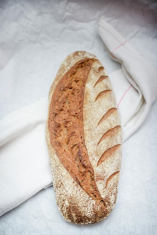Sourdough Bread On A White Background Photograph by Nitin Kapoor