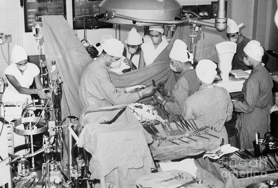 South African Surgical Team Operating Photograph by Bettmann South African Surgical Team Operating Photograph by Bettmann