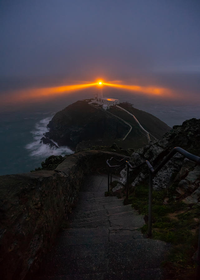South Stack Lighthouse In Wales Seen On A Beautiful Misty Night. Photograph