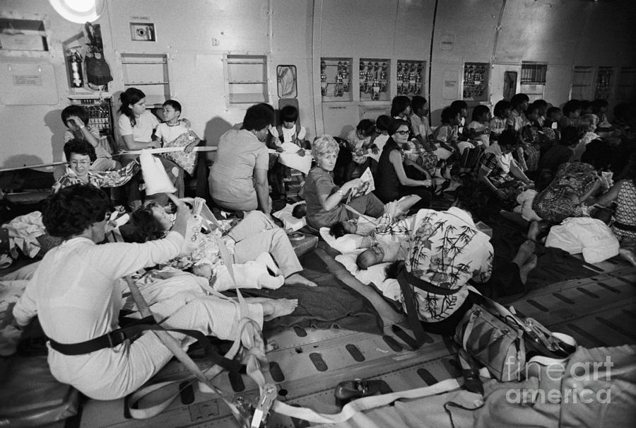 South Vietnamese Orphans On Plane Photograph by Bettmann