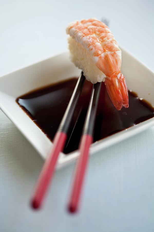 Soy Sauce With A Prawn Nigiri Sushi Photograph by Martina Schindler