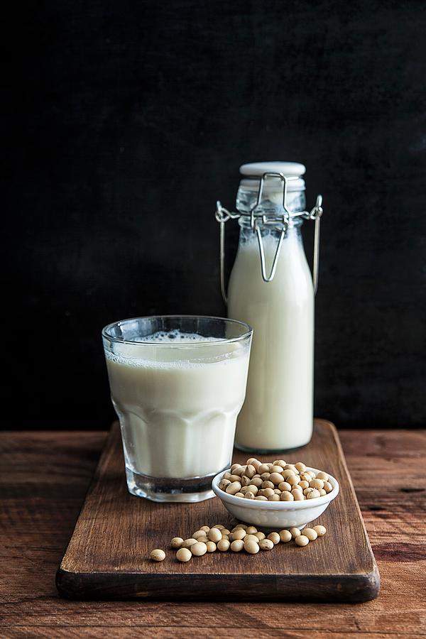 Soya Milk And Dried Soya Beans Photograph by The Food Union