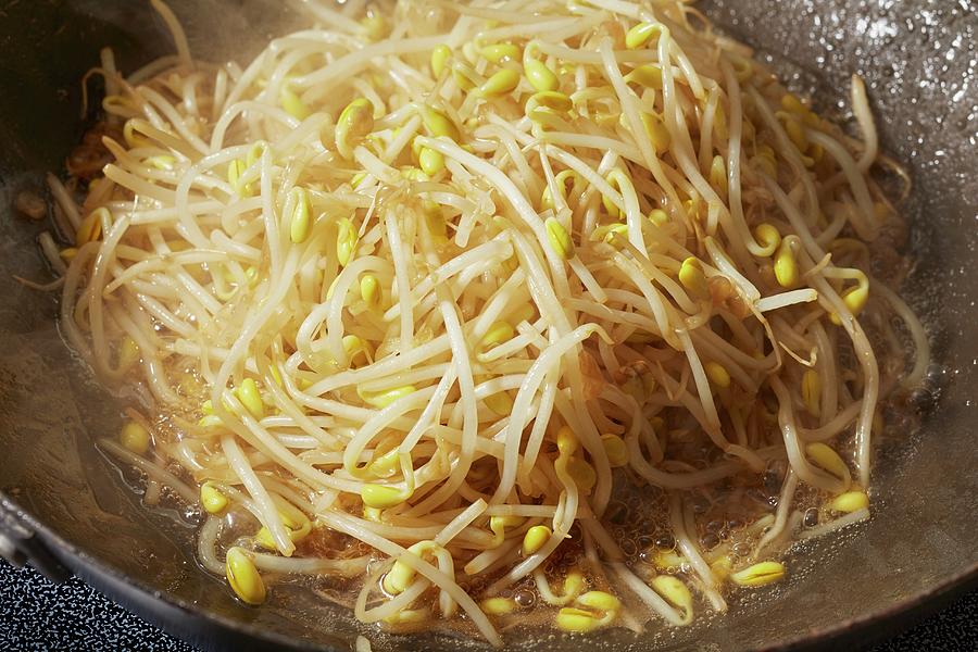 Soybean Sprouts Being Fried In A Wok With Rice Wine And Soy Sauce china Photograph by Brian Yarvin