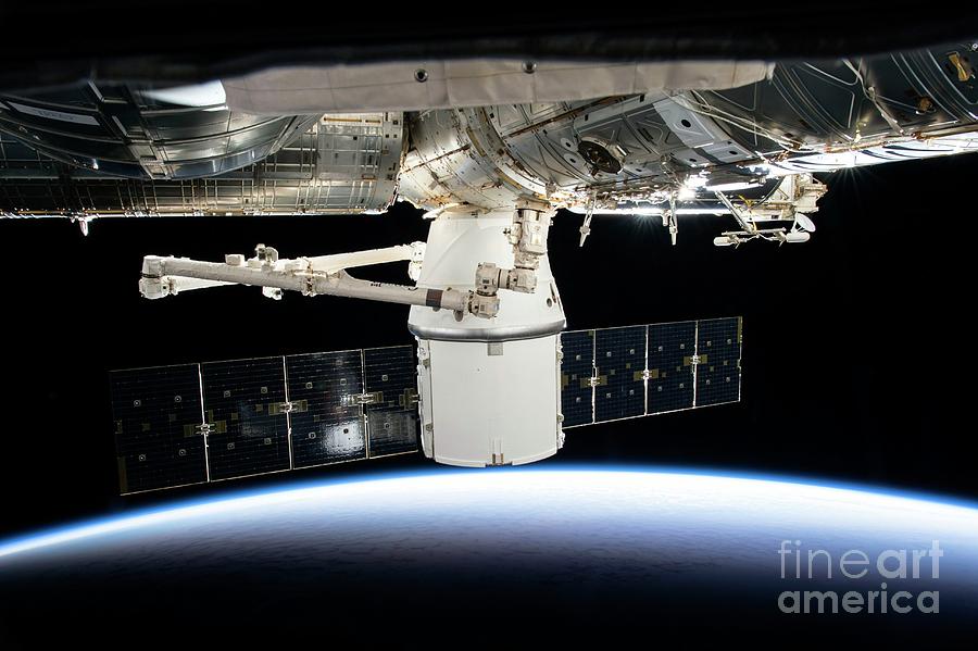 Spacex Dragon Cargo Spacecraft At The Iss Photograph by Nasa/science Photo Library
