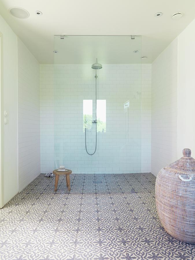 Spacious, Modern Shower Area With Rainfall Shower, Glass Screen And Floral-patterned Cement Tiles On Floor Photograph by Peter Carlsson